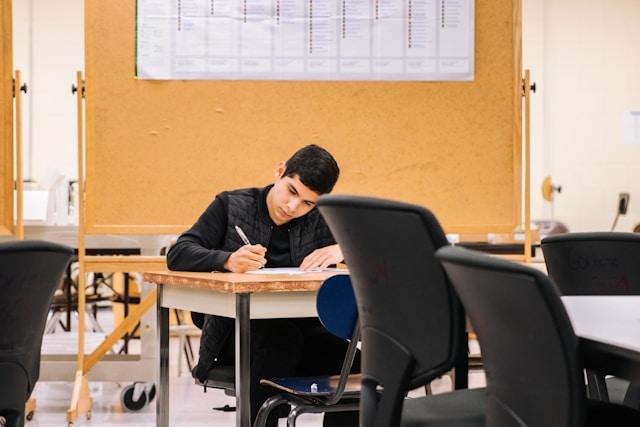 person siting at desk and working